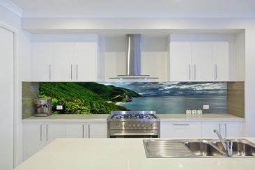 Modern kitchen with printed glass splashback